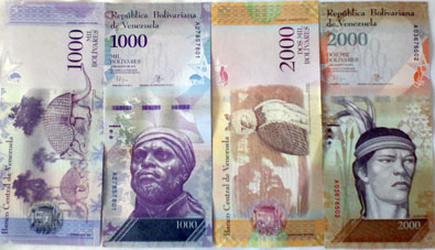 Новые венесуэльские денежные знаки 1000 и 2000 боливаров.